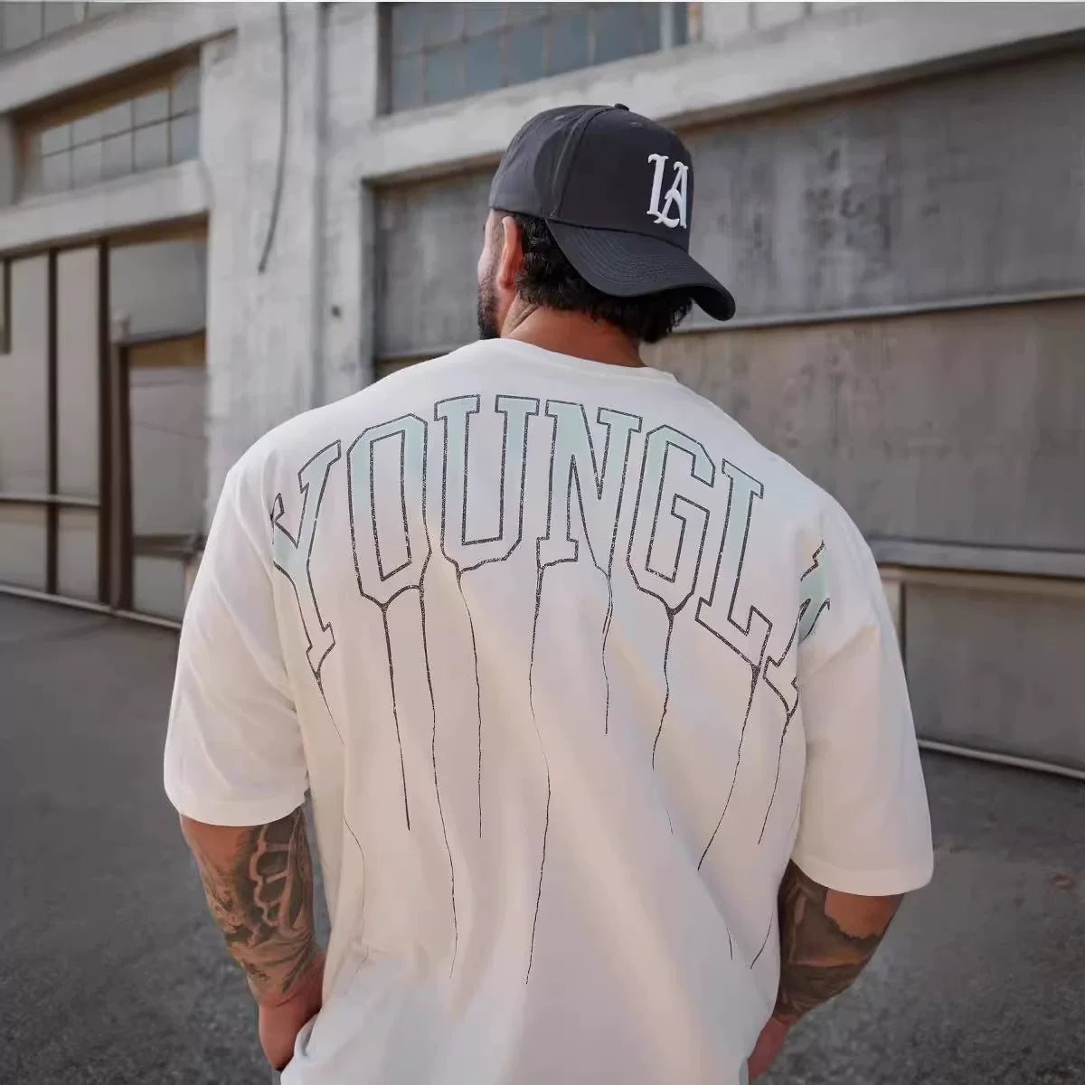YoungLA Heavyweight Acid Wash Oversized Tee – Cream Drip Arc Back Artwork